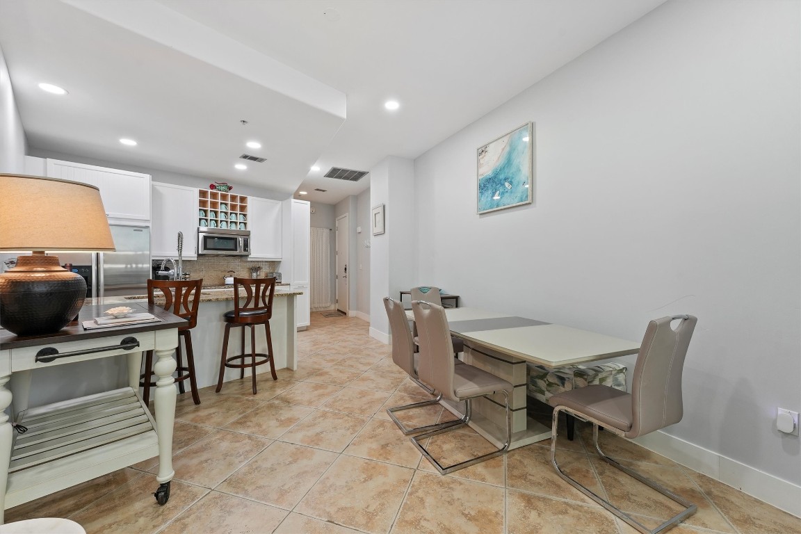 10327 Termini-San Luis Pass Road, Unit 319 Galveston, TX 77554 - Photo 13 of 28 Dining table set for 6!