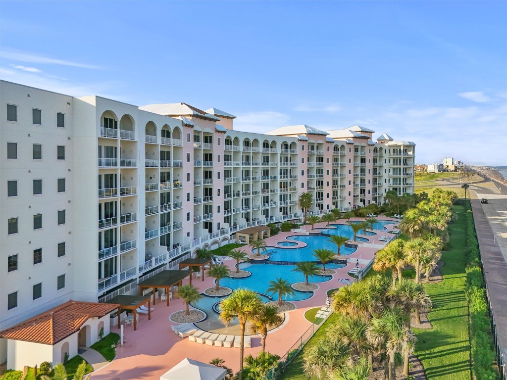 10327 Termini-San Luis Pass Road, Unit 319 Galveston, TX 77554 - Photo 15 of 28 300ft long tiered pool. Along with Cabanas and lounge chairs through out.