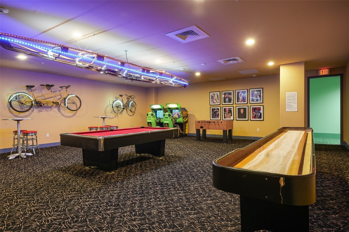 10327 Termini-San Luis Pass Road, Unit 319 Galveston, TX 77554 - Photo 22 of 28 Arcade room.