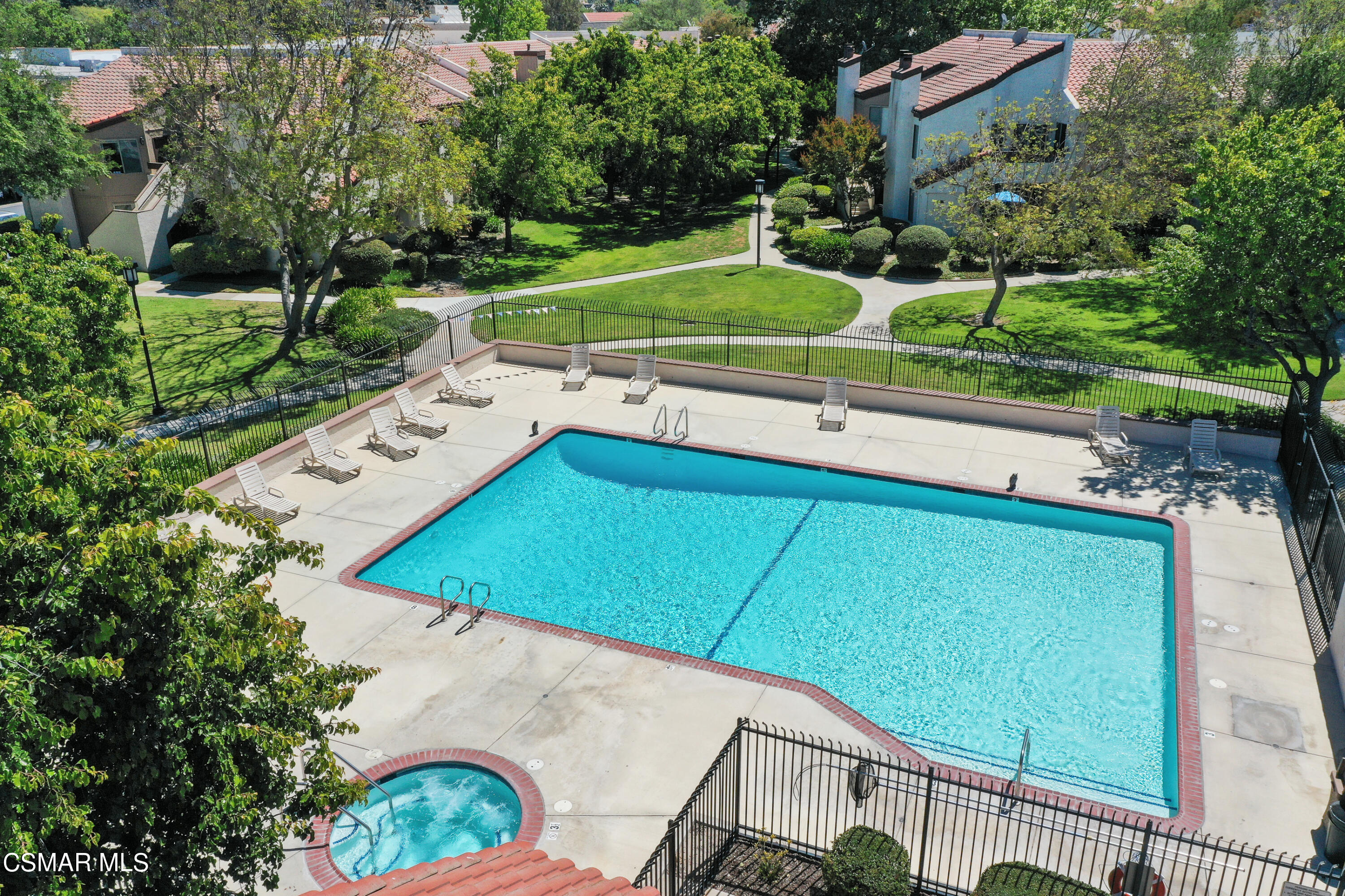 1724 Sinaloa Road, Unit 128 Simi Valley, CA 93065 - Photo 13 of 14 a view of a tennis ground with a small pool