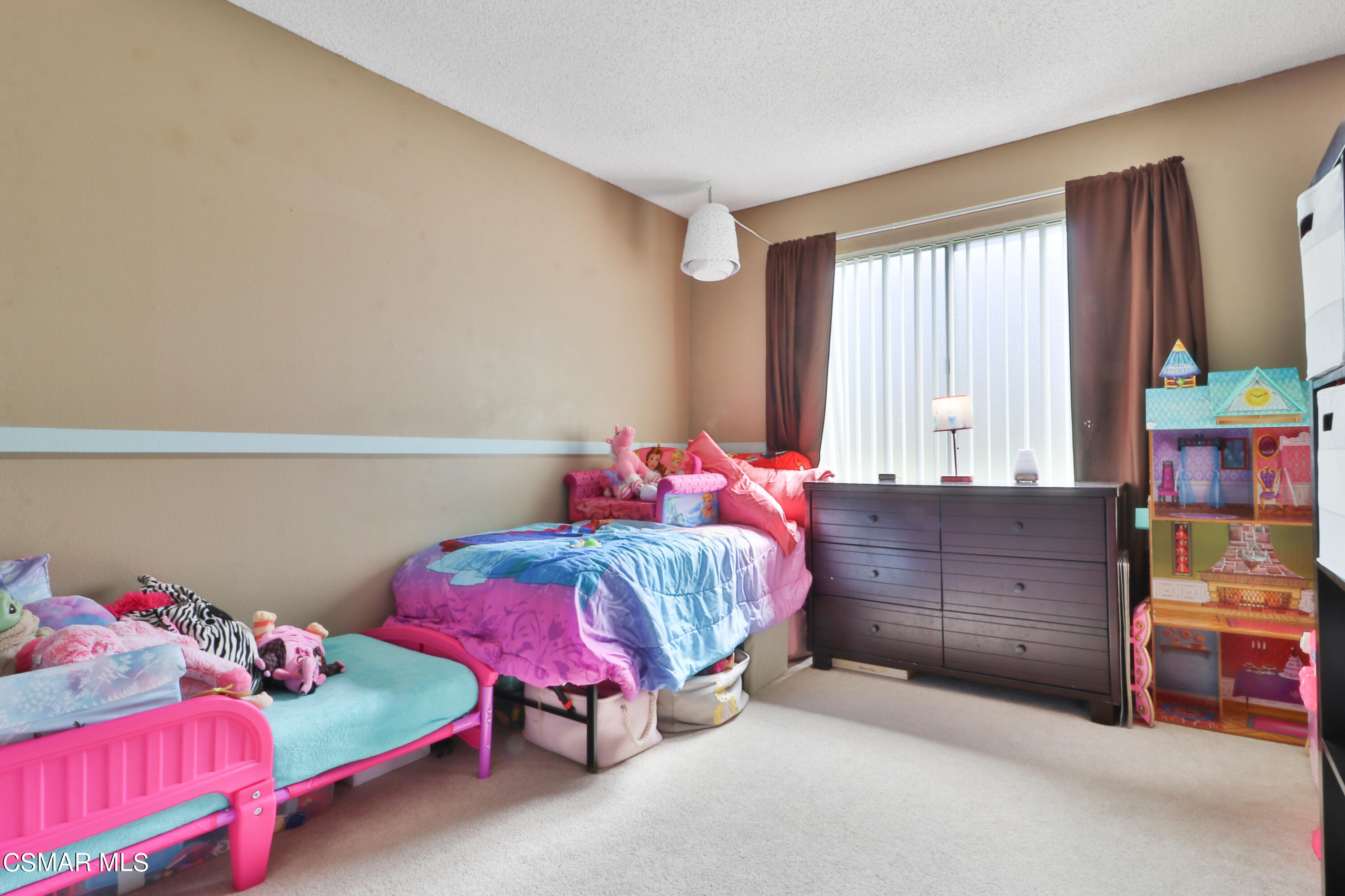 1724 Sinaloa Road, Unit 128 Simi Valley, CA 93065 - Photo 5 of 14 a bedroom with a bed and a window