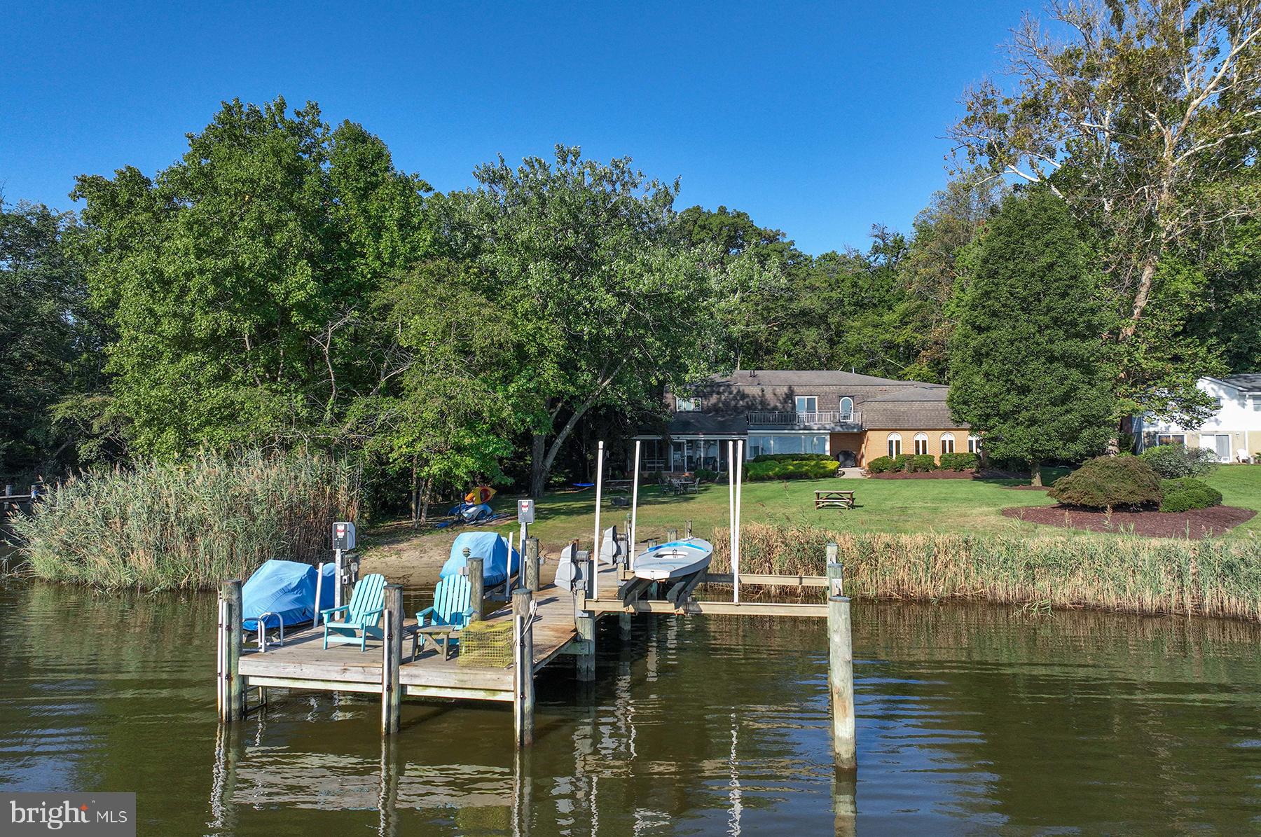 501 Edgewater Road Pasadena, MD 21122 - Photo 3 of 3 Private pier has 2 jet ski lifts & a 10k lb lift
