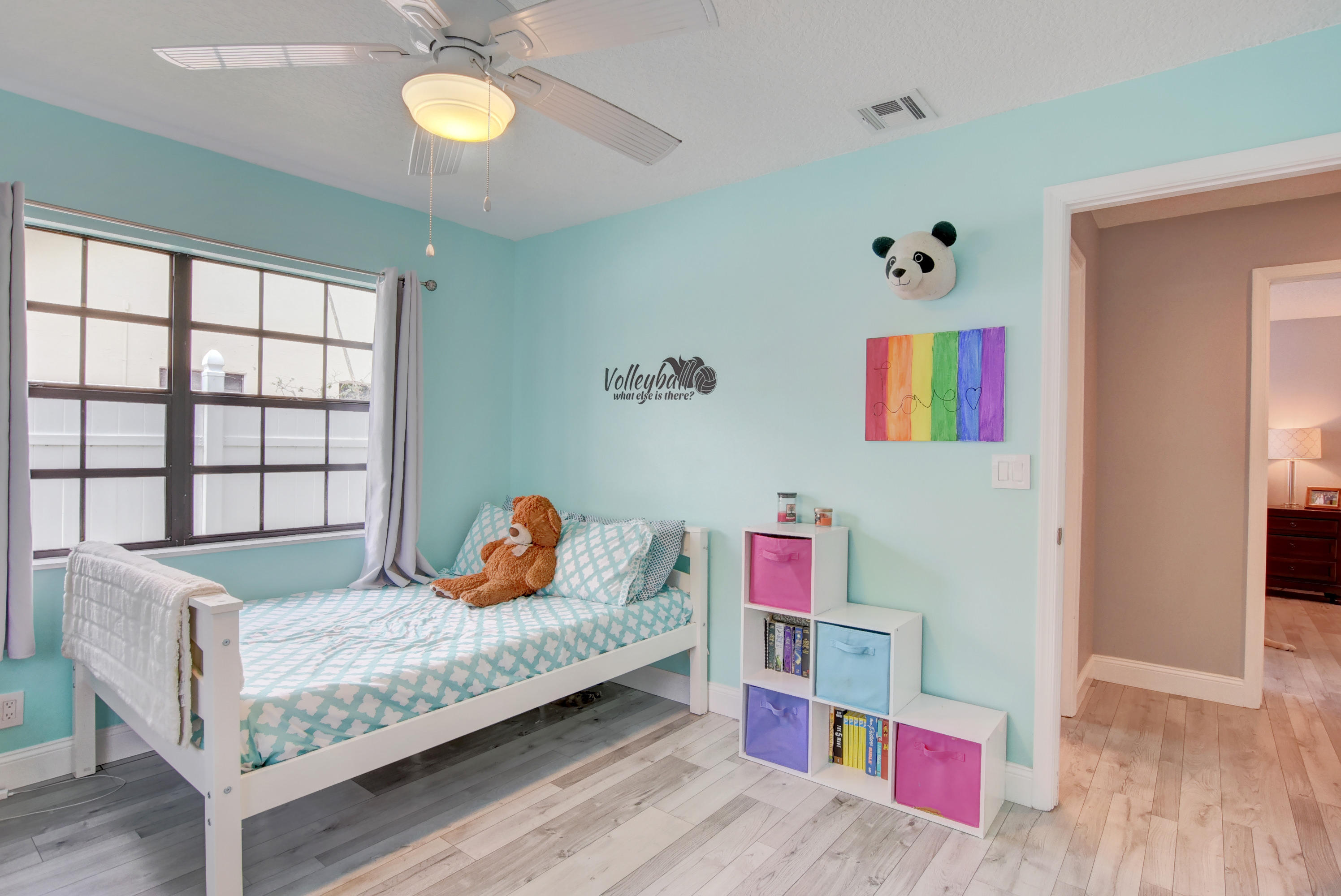7445 Texas Trail Boca Raton, FL 33487 - Photo 18 of 28 a bedroom with a bed and a window