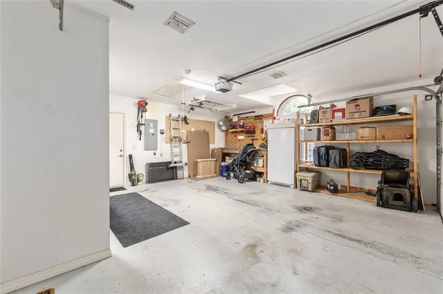 a view of a house with backyard and garden