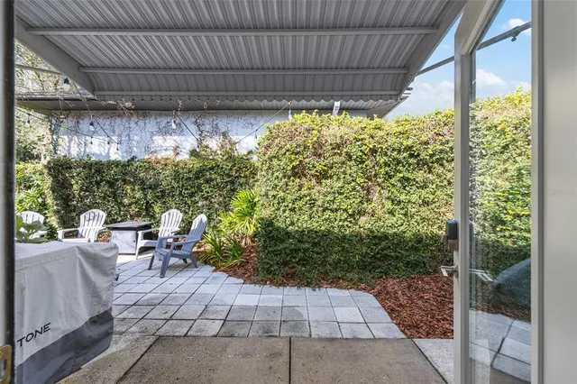 a view of backyard with green space