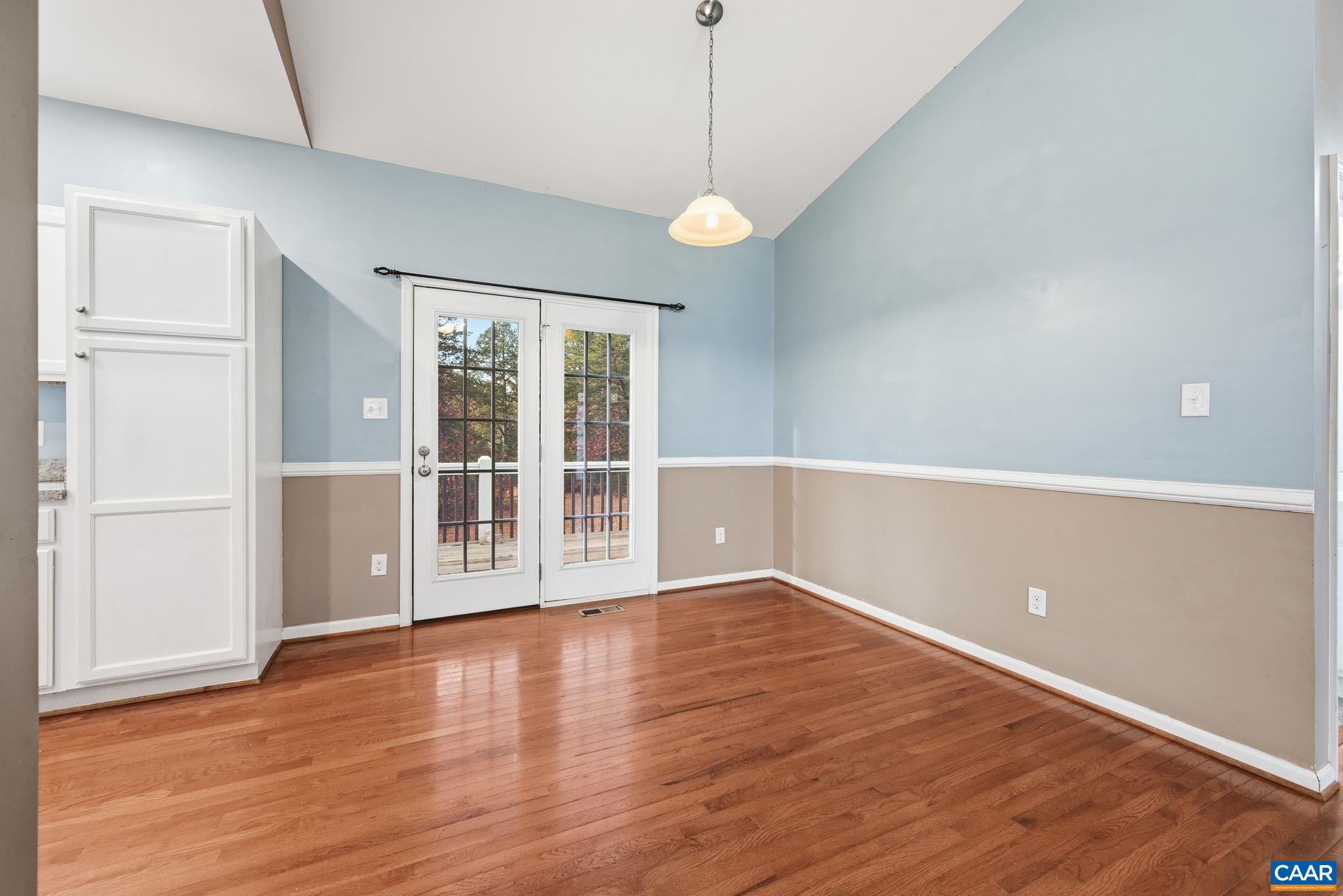 2093 Swift Run Road Ruckersville, VA 22968 - Photo 13 of 57 a view of an empty room with wooden floor and a window