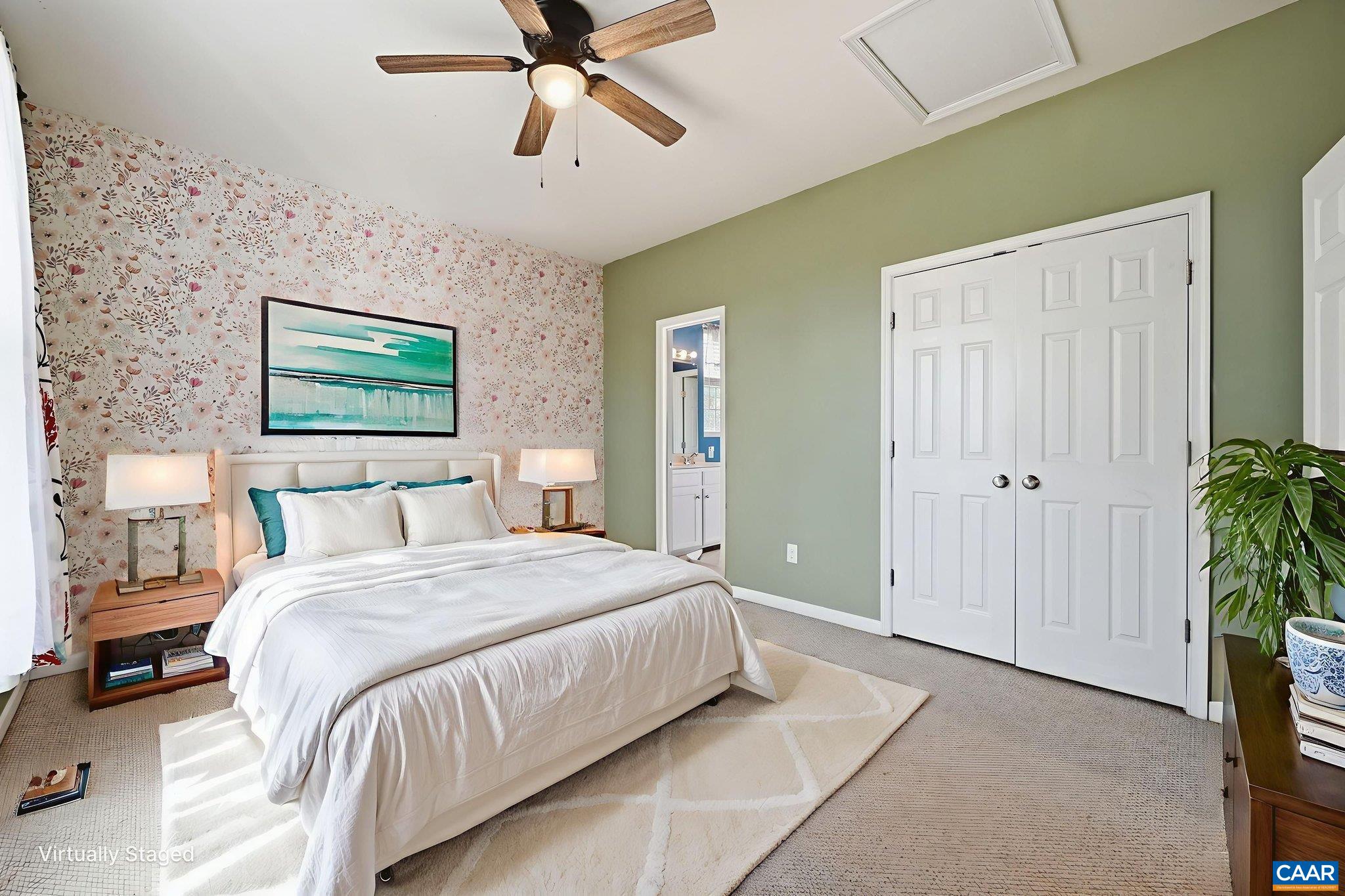 2093 Swift Run Road Ruckersville, VA 22968 - Photo 19 of 57 a bedroom with a bed and a painting on the wall