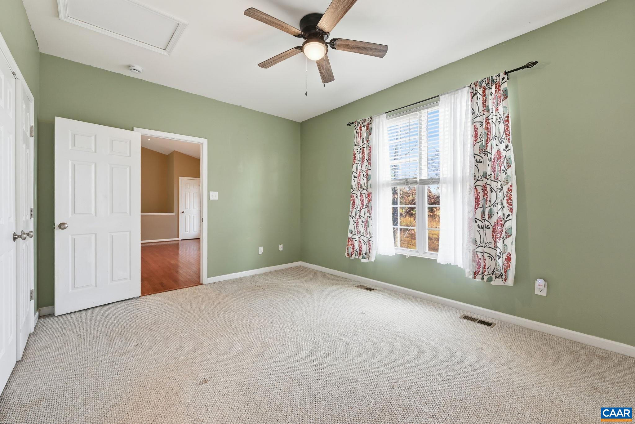 2093 Swift Run Road Ruckersville, VA 22968 - Photo 21 of 57 a view of an empty room with a window