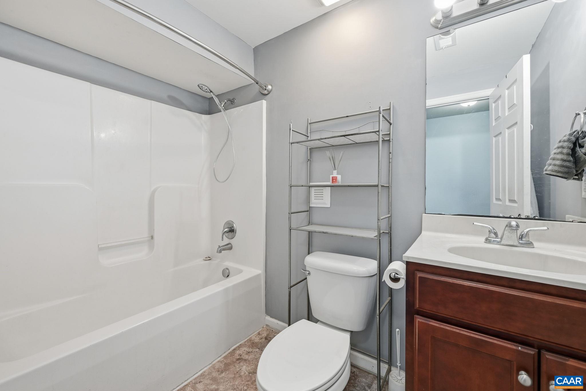 2093 Swift Run Road Ruckersville, VA 22968 - Photo 34 of 57 a bathroom with a sink toilet and shower