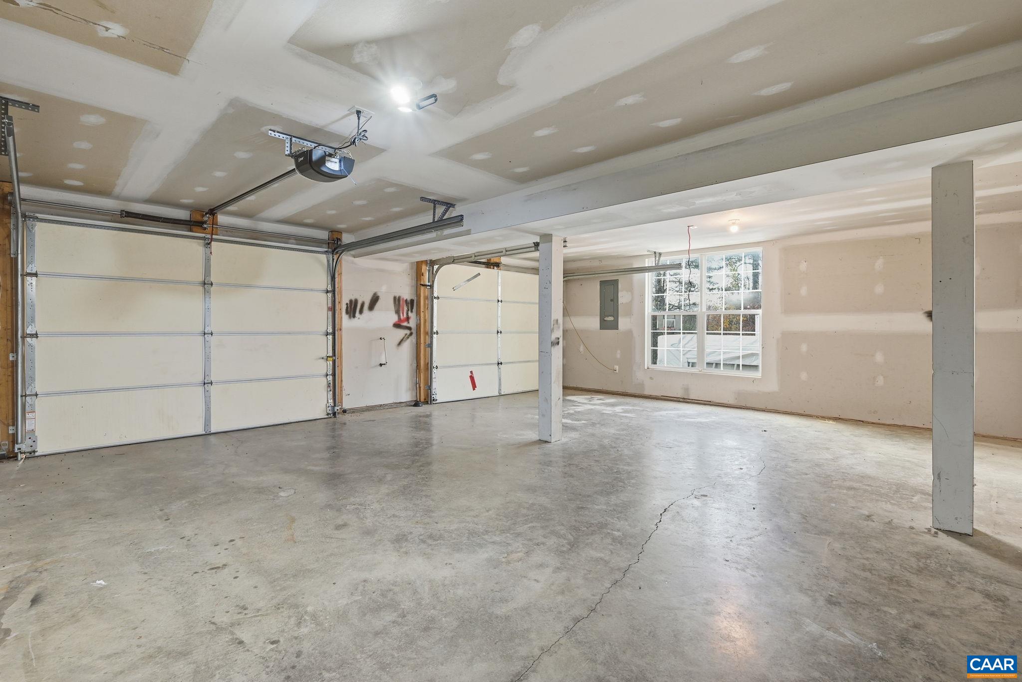 2093 Swift Run Road Ruckersville, VA 22968 - Photo 37 of 57 an empty room with a empty space and windows