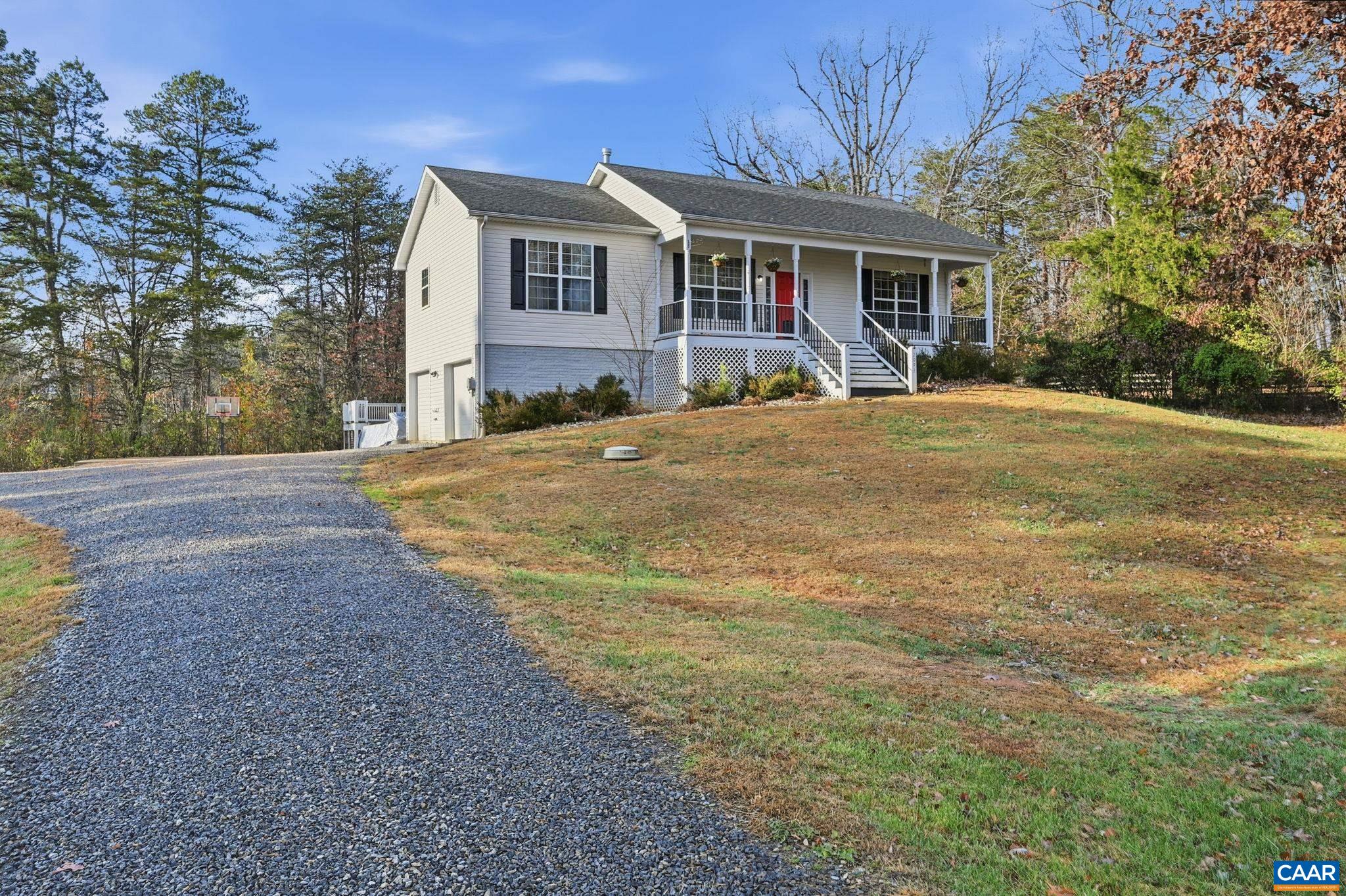 2093 Swift Run Road Ruckersville, VA 22968 - Photo 4 of 57 a front view of a house with yard and green space