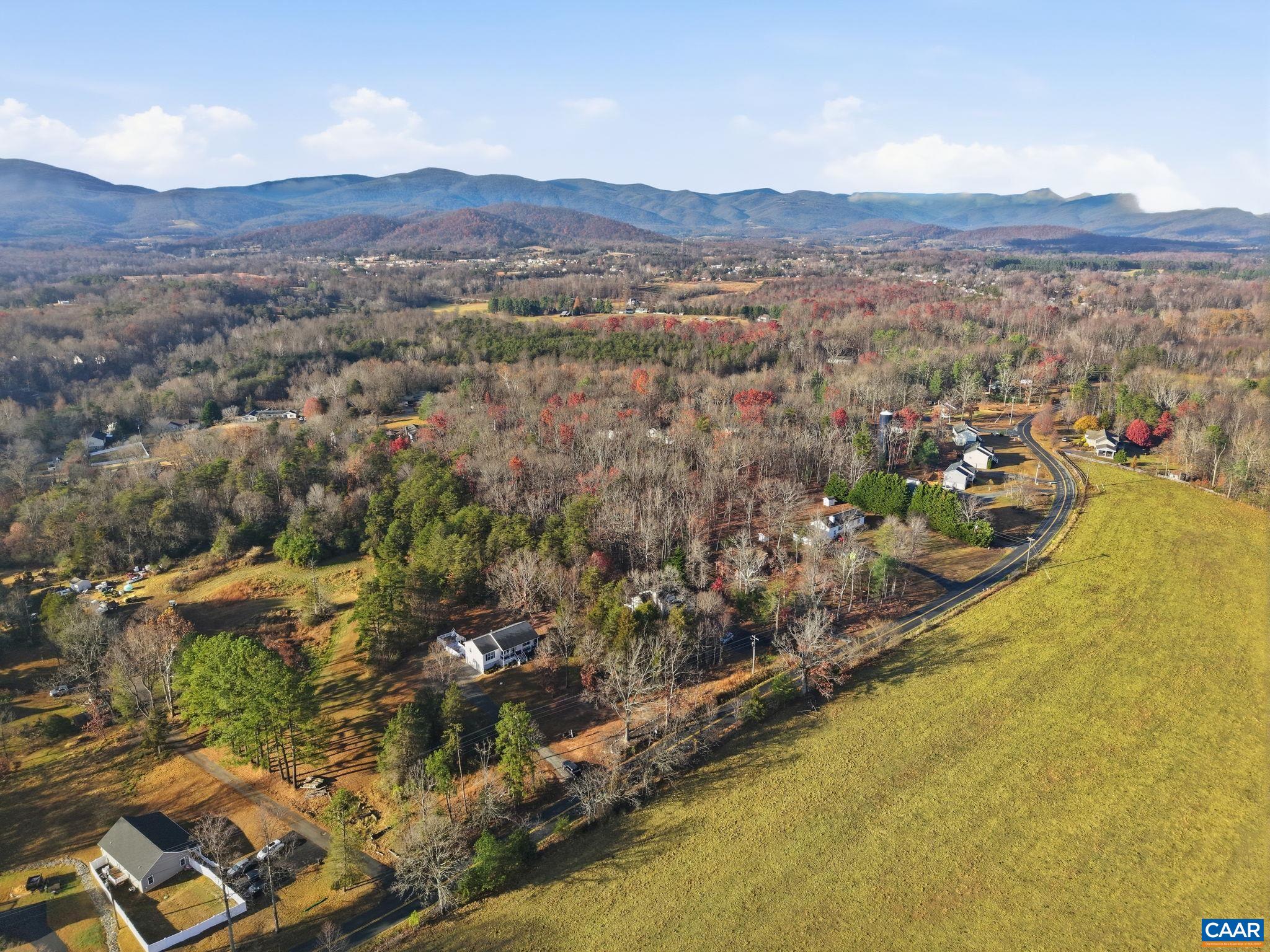 2093 Swift Run Road Ruckersville, VA 22968 - Photo 45 of 57 an aerial view of residential house and lake view