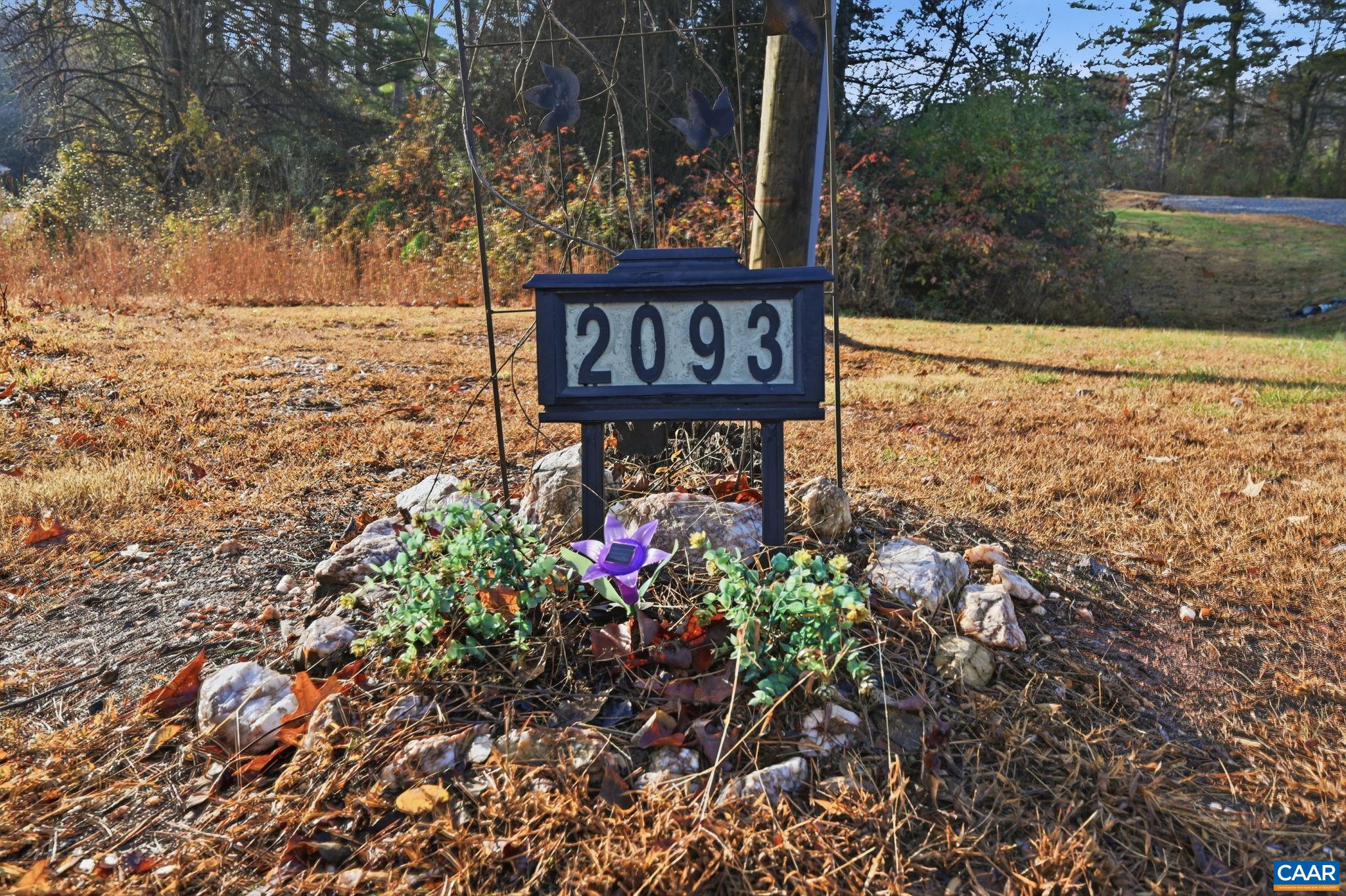 2093 Swift Run Road Ruckersville, VA 22968 - Photo 54 of 57 a sign that is sitting in the middle of the forest