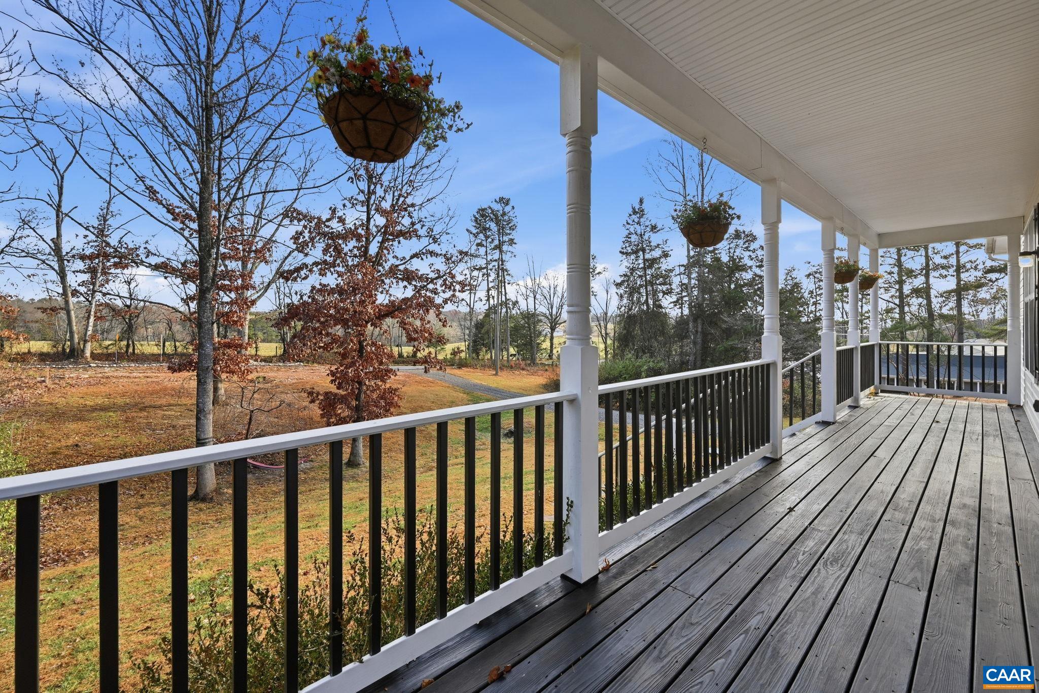 2093 Swift Run Road Ruckersville, VA 22968 - Photo 6 of 57 a view of balcony with wooden floor