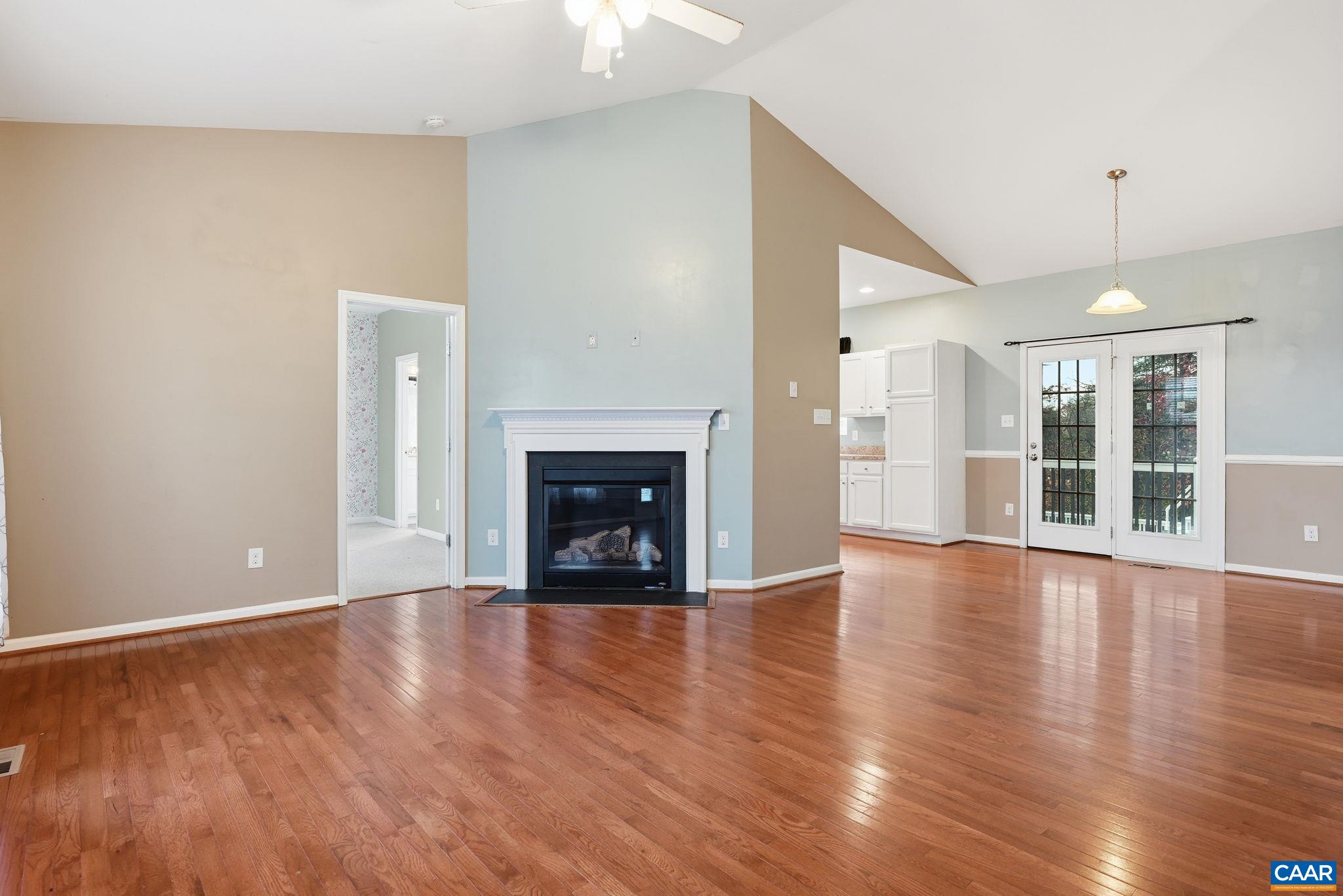 2093 Swift Run Road Ruckersville, VA 22968 - Photo 10 of 57 a view of an empty room with wooden floor and a window