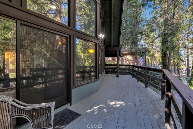a living room with furniture fireplace and flat screen tv