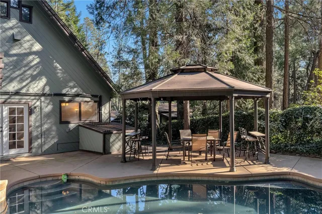 a large tree in the middle of a yard