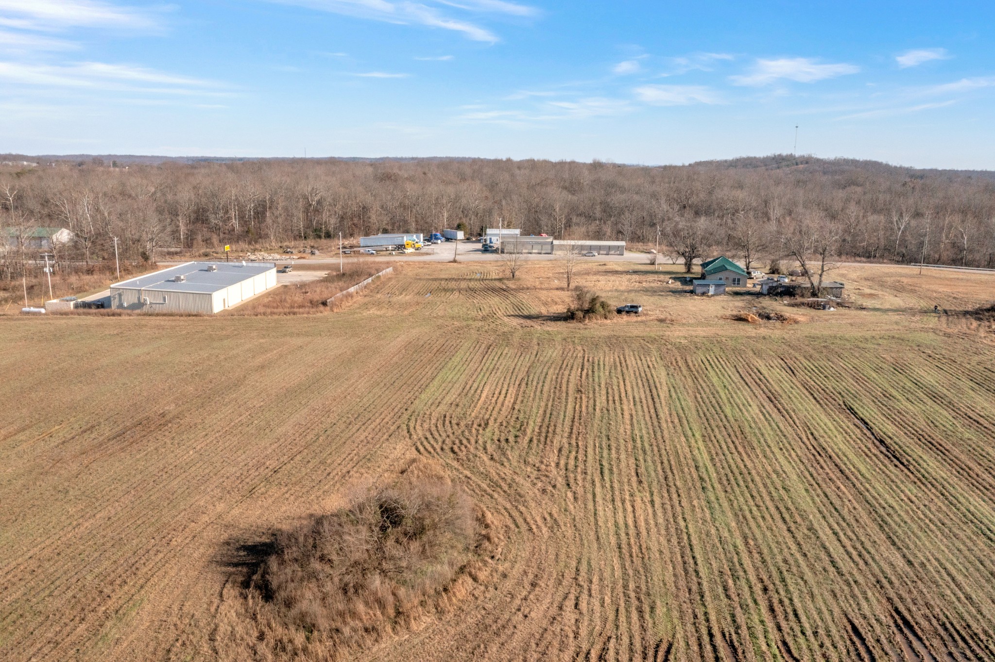 0 Madisonville Road Hopkinsville, KY 42240 - Photo 2 of 16 a view of a dry yard with wooden fence