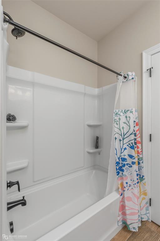 122 Brimestone Loop Benton, LA 71006 - Photo 26 of 33 a bathroom with a bathtub and a shower