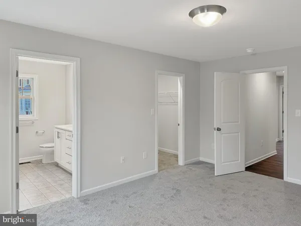 a view of a bathroom with toilet