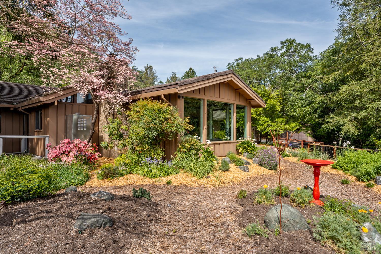 308 Jefferson Lane Ukiah, CA 95482 - Photo 2 of 50 a front view of a house with a yard and fountain