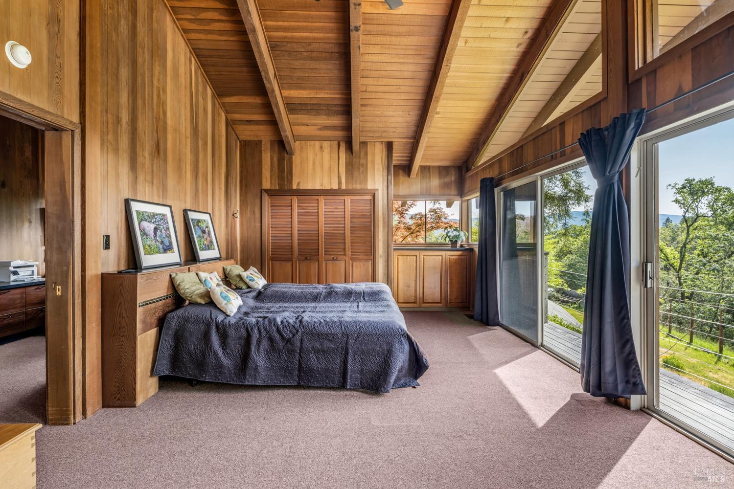 308 Jefferson Lane Ukiah, CA 95482 - Photo 23 of 50 a bedroom with furniture and large windows