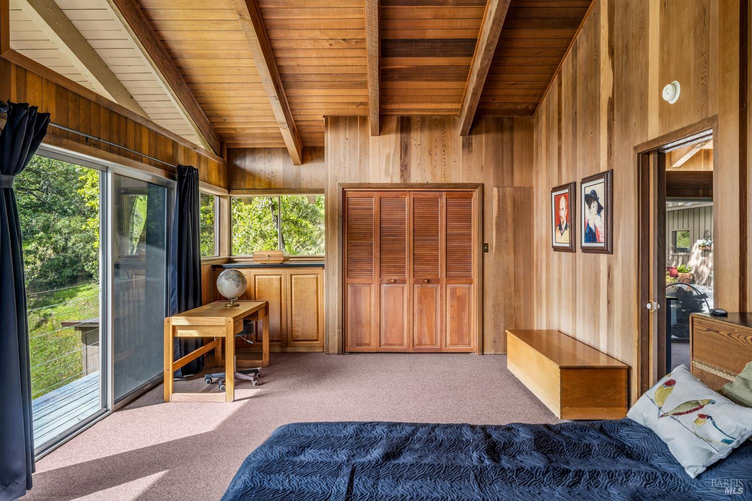 308 Jefferson Lane Ukiah, CA 95482 - Photo 24 of 50 a living room with furniture a flat screen tv and floor to ceiling window