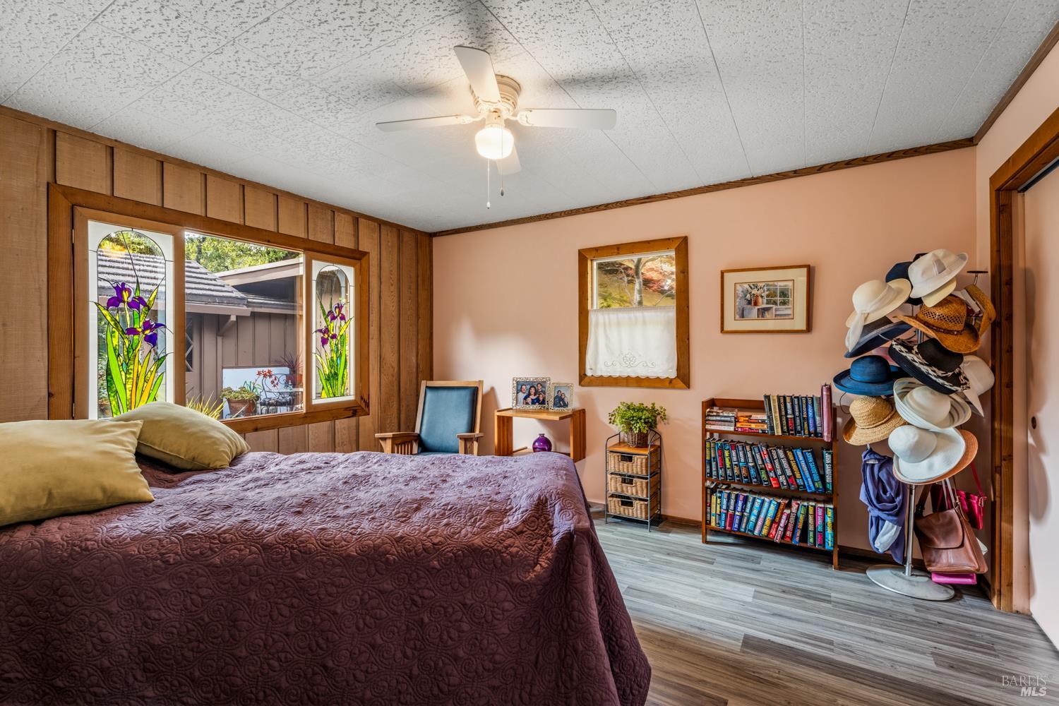308 Jefferson Lane Ukiah, CA 95482 - Photo 27 of 50 a bedroom with a bed a dresser and a large window