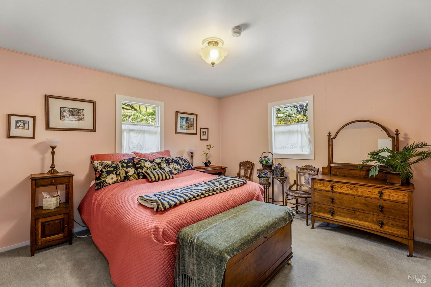 308 Jefferson Lane Ukiah, CA 95482 - Photo 28 of 50 a bedroom with a bed and a chandelier