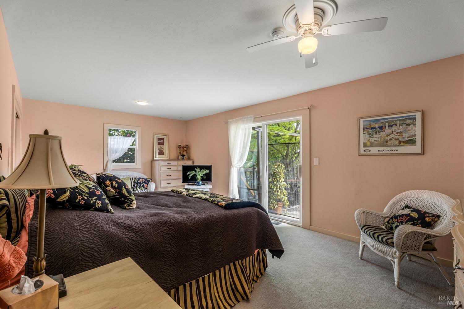 308 Jefferson Lane Ukiah, CA 95482 - Photo 31 of 50 a bedroom with a bed and wooden floor