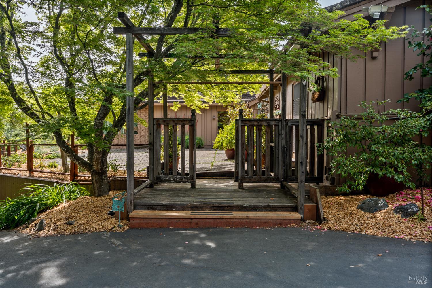 308 Jefferson Lane Ukiah, CA 95482 - Photo 34 of 50 a view of a entrance gate of the house and trees