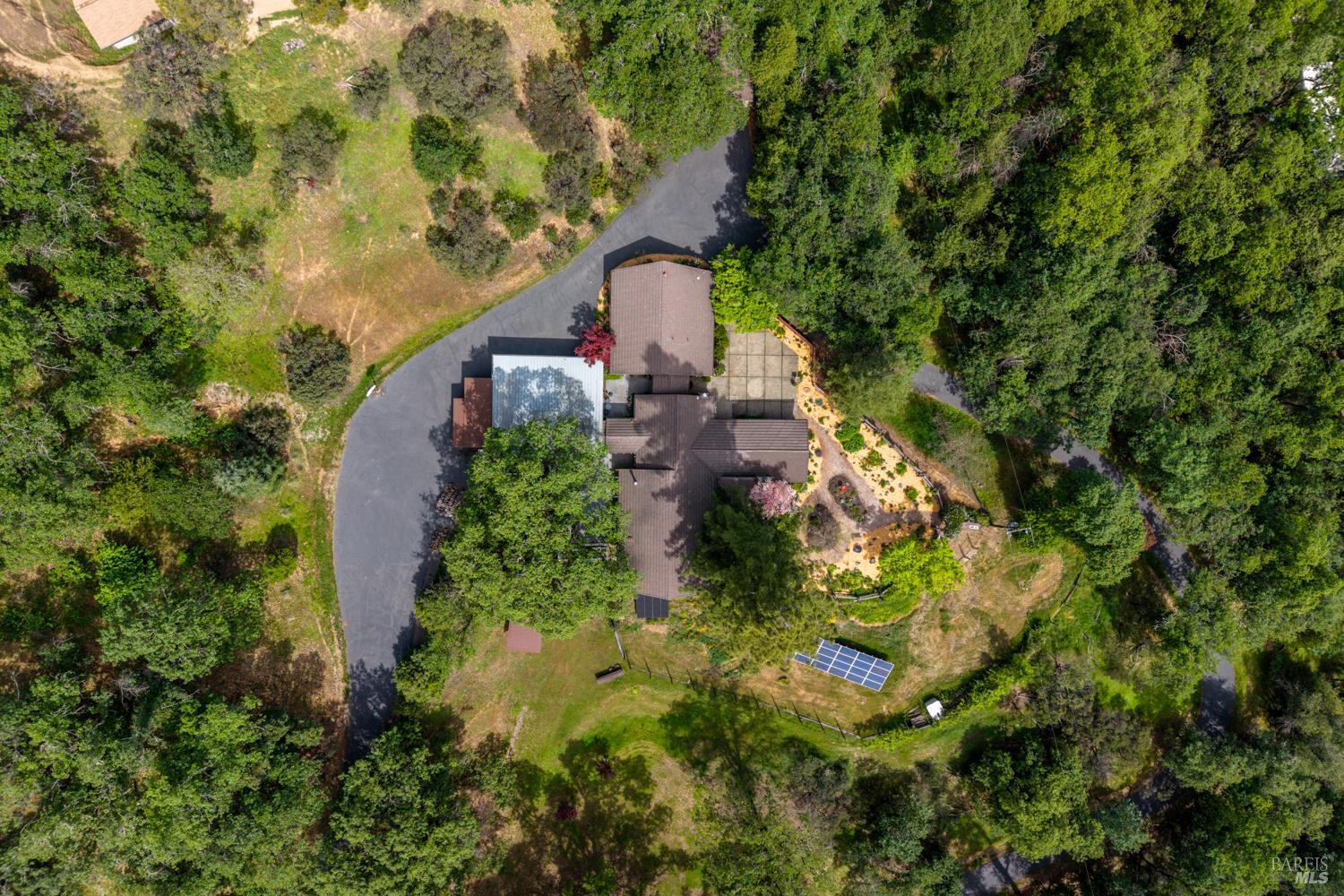 308 Jefferson Lane Ukiah, CA 95482 - Photo 49 of 50 an aerial view of a house with a yard and large trees