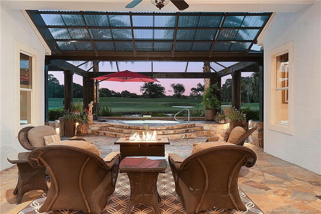 2109 Southeast Talbot Place Stuart, FL 34997 - Photo 30 of 59 Seating area on the covered patio with great views