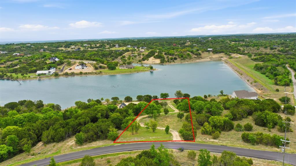 305 Compass Way Bluff Dale Bluff Dale, TX 76433 - Photo 1 of 25 an aerial view of ocean residential houses with outdoor space and lake view
