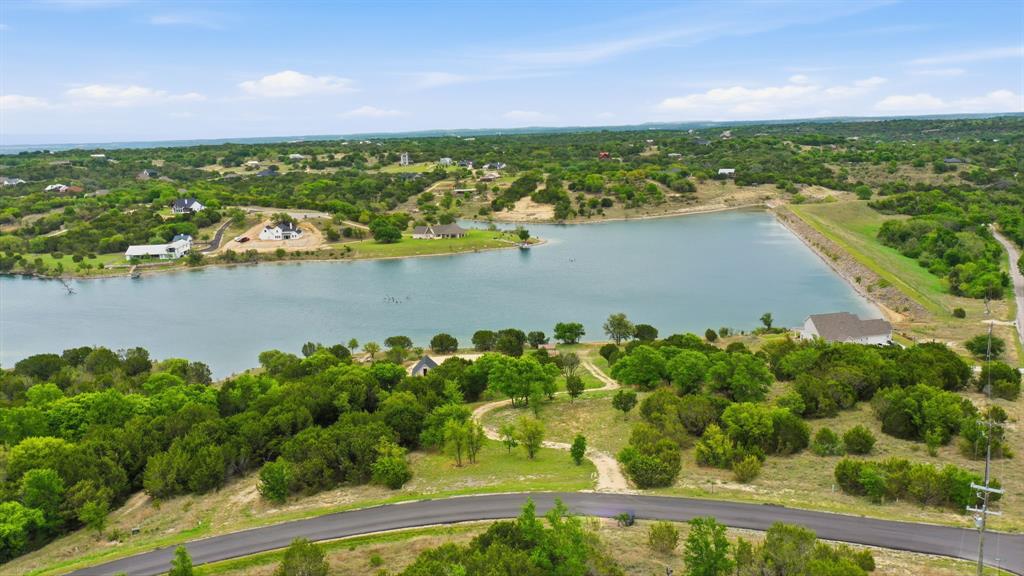 305 Compass Way Bluff Dale Bluff Dale, TX 76433 - Photo 13 of 25 an aerial view of ocean residential houses with outdoor space and lake view