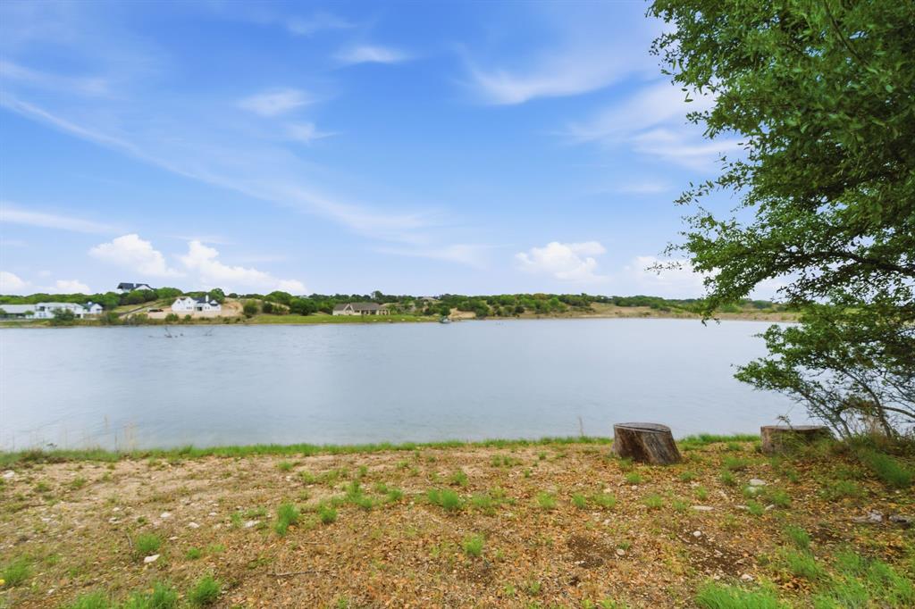 305 Compass Way Bluff Dale Bluff Dale, TX 76433 - Photo 15 of 25 a view of a lake