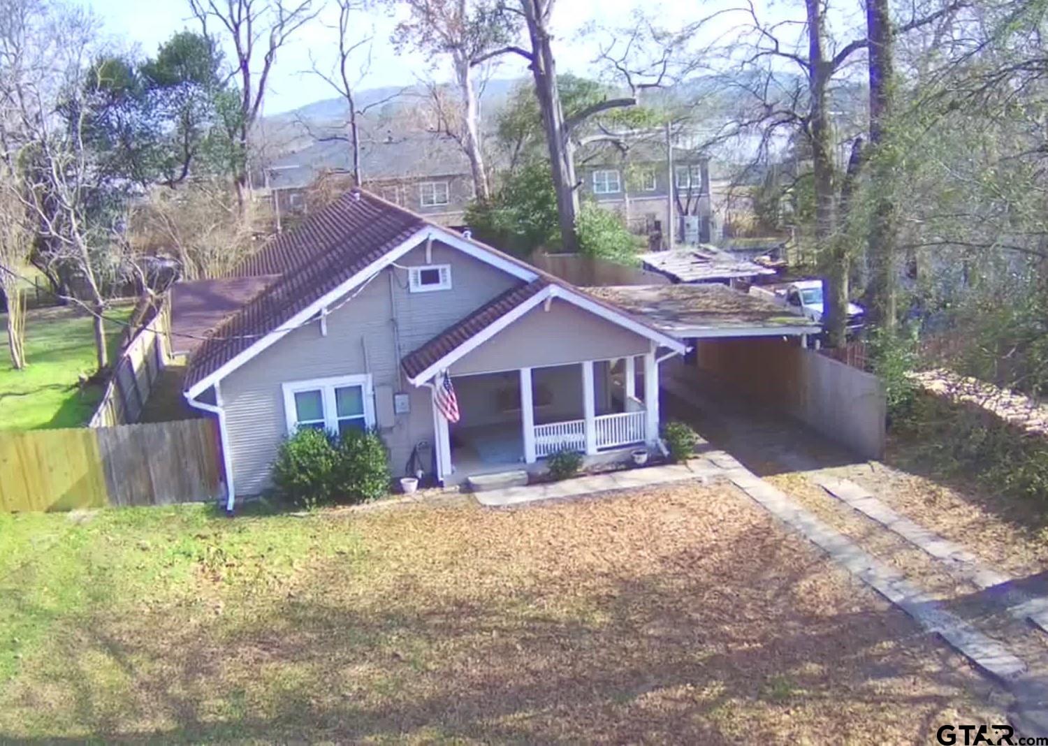 507 North Trinity Street Gilmer, TX 75644 - Photo 2 of 45 a view of a house with a yard