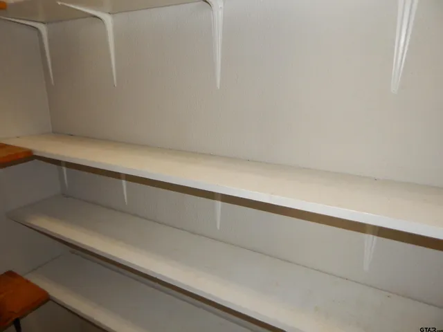 a kitchen with a stove and a microwave