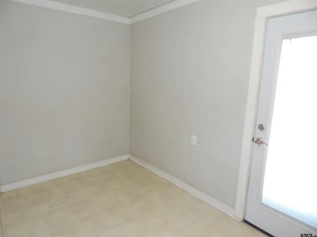 a view of storage and utility room with washer and dryer