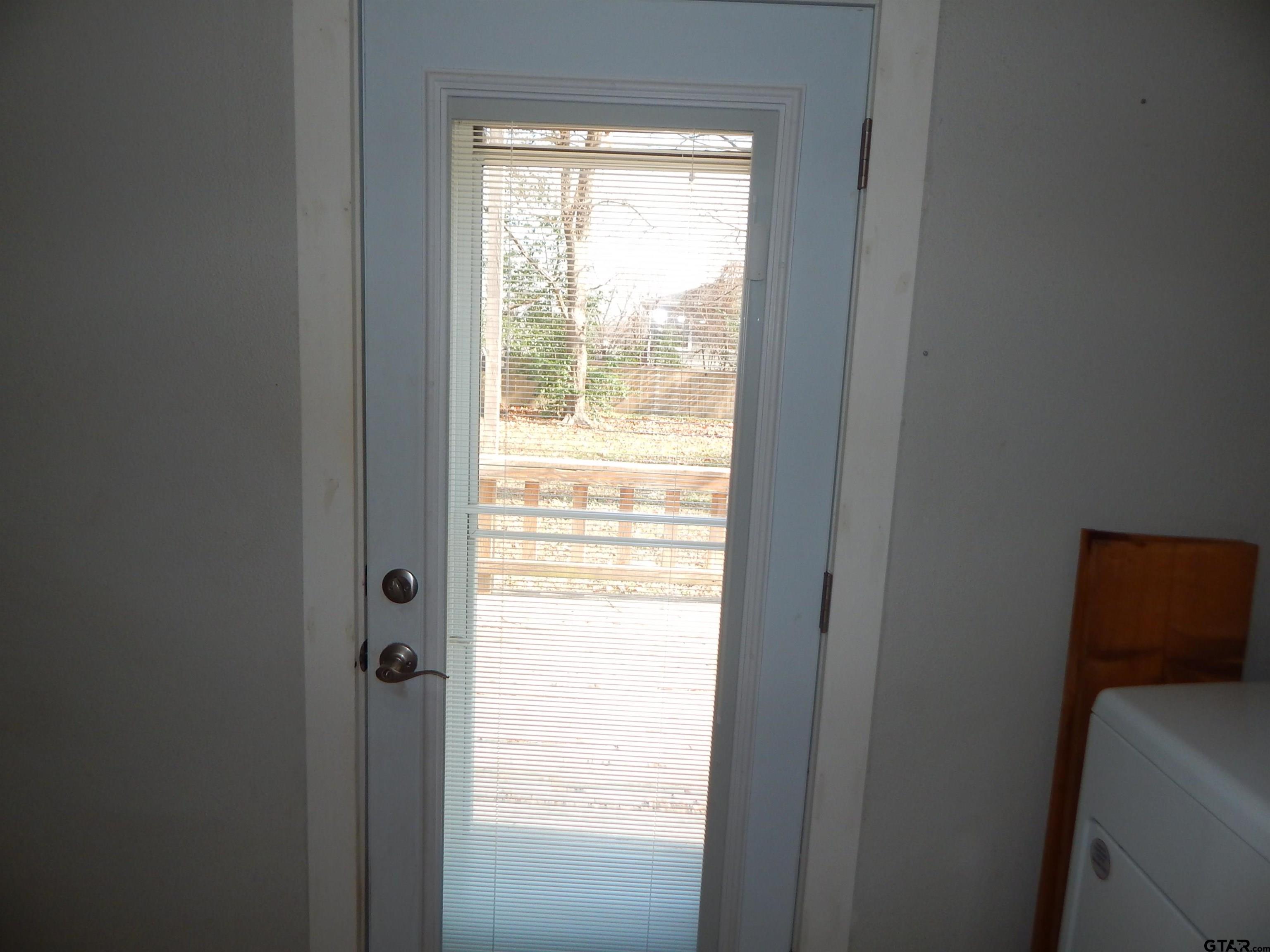 507 North Trinity Street Gilmer, TX 75644 - Photo 30 of 45 a view of an empty room and window