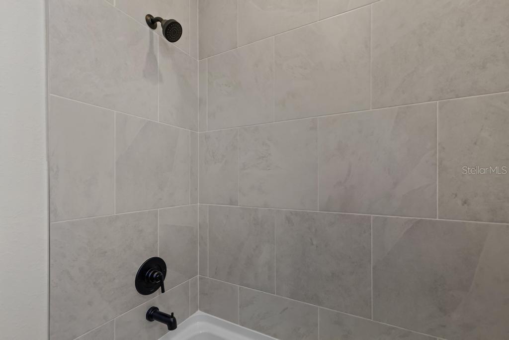 60 Pegasus Road Flagler Beach, FL 32136 - Photo 11 of 51 a bathroom with a shower