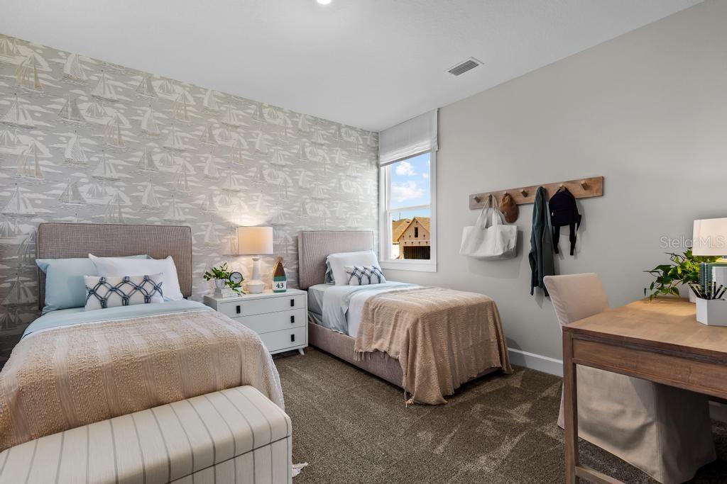 60 Pegasus Road Flagler Beach, FL 32136 - Photo 13 of 51 a bedroom with a bed and wooden floor