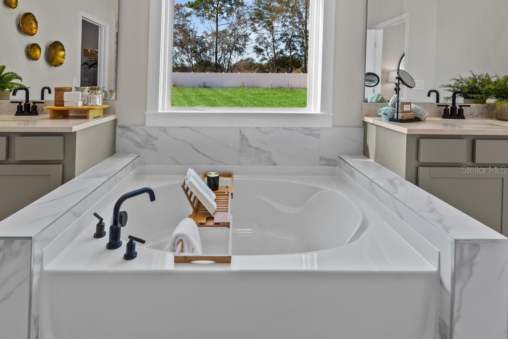 60 Pegasus Road Flagler Beach, FL 32136 - Photo 42 of 51 a bathroom with a sink and a mirror