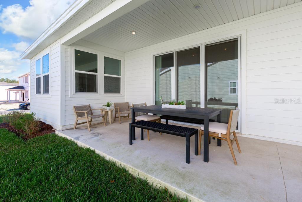 60 Pegasus Road Flagler Beach, FL 32136 - Photo 47 of 51 a view of a patio with table and chairs