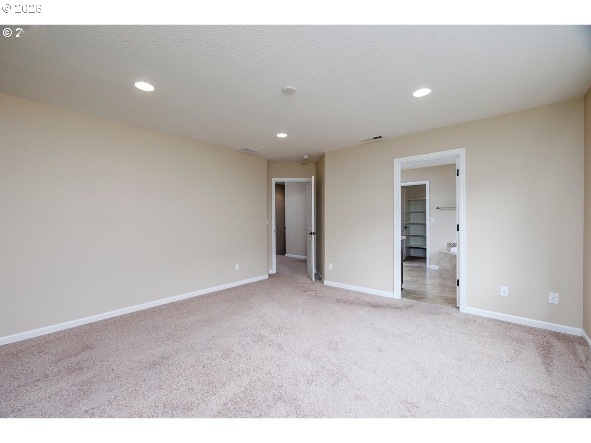 15997 Northwest Rossetta Street Portland, OR 97229 - Photo 19 of 36 a view of an empty room