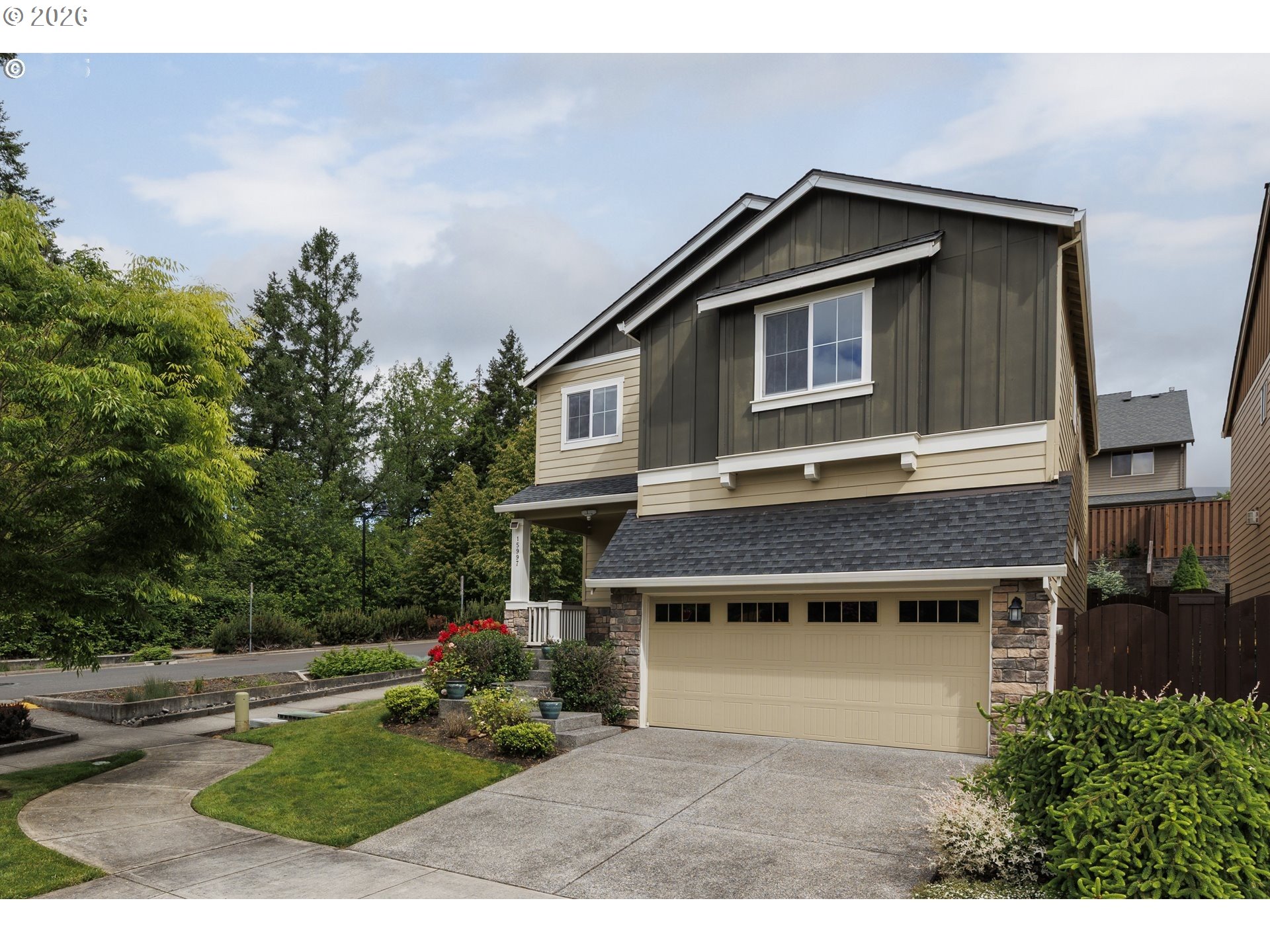 15997 Northwest Rossetta Street Portland, OR 97229 - Photo 2 of 36 a front view of a house with a yard
