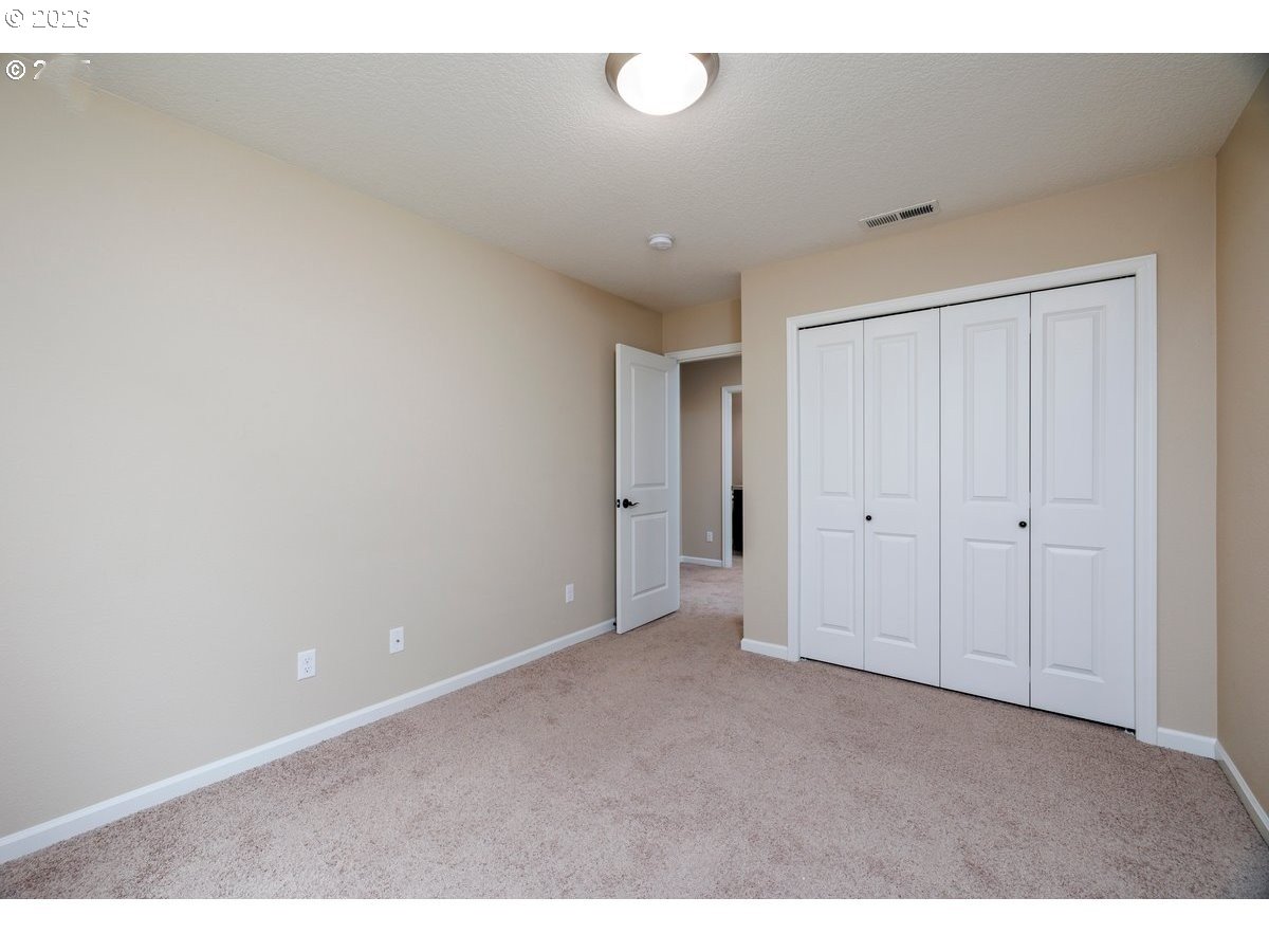 15997 Northwest Rossetta Street Portland, OR 97229 - Photo 25 of 36 a view of an empty room