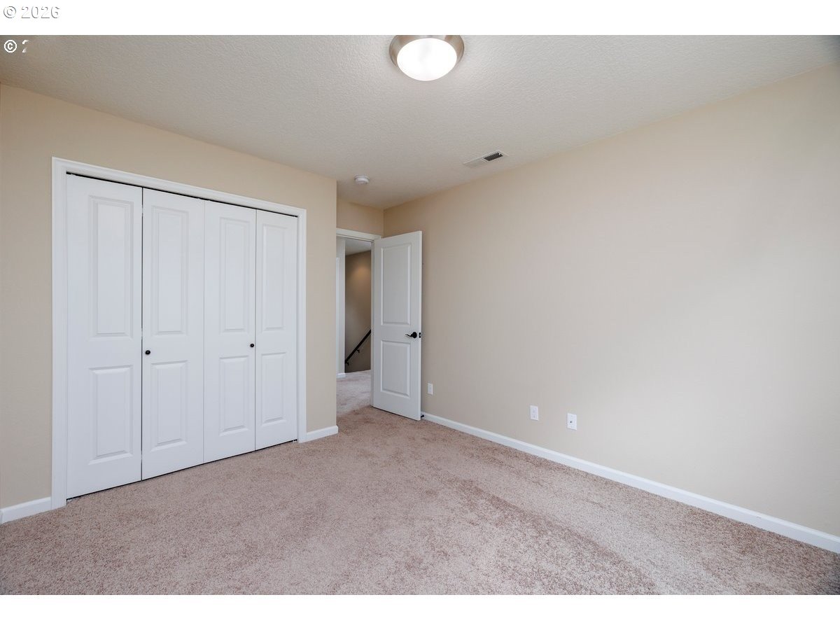 15997 Northwest Rossetta Street Portland, OR 97229 - Photo 27 of 36 a view of an empty room