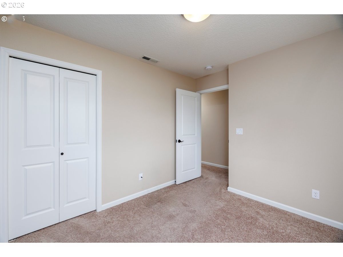 15997 Northwest Rossetta Street Portland, OR 97229 - Photo 30 of 36 a view of an empty room