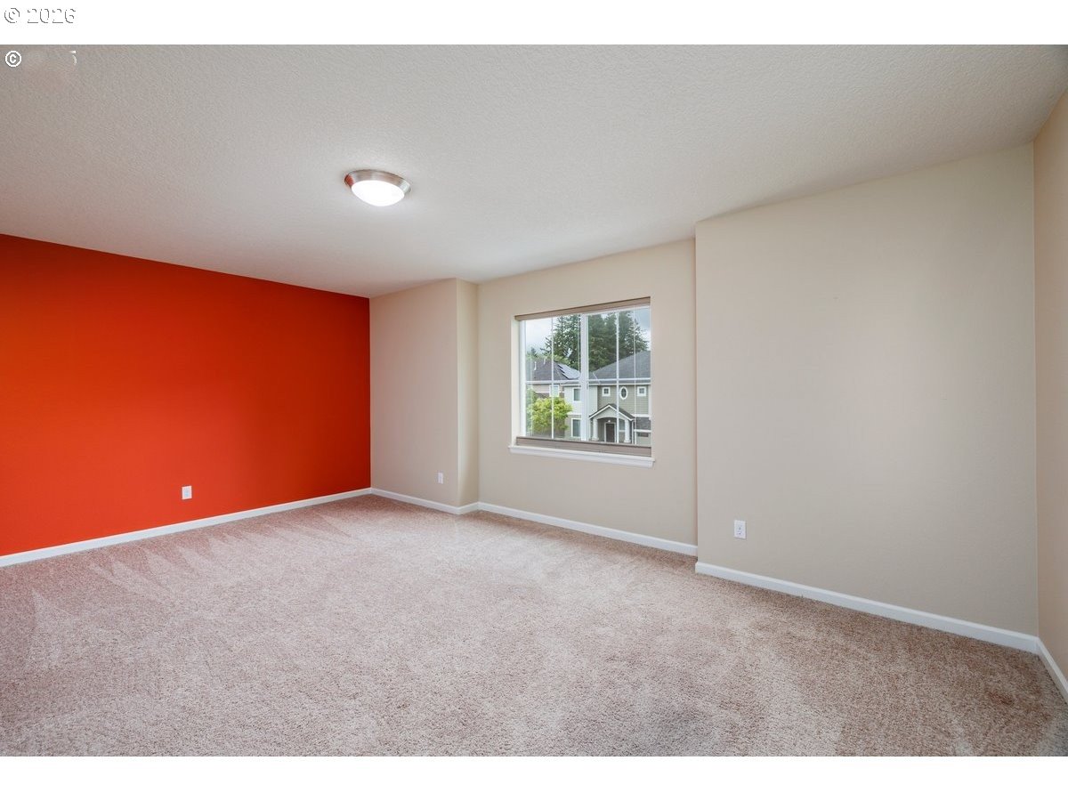 15997 Northwest Rossetta Street Portland, OR 97229 - Photo 31 of 36 an empty room with windows